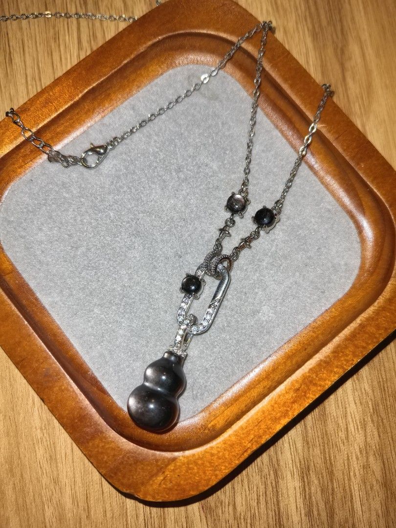 Silver Obsidian Gourd Pendant Necklace (Category: Necklaces) located in Santa Rosa. Submitted by crystal1.0 (Listing ID 1439221047, Image 1). Description: No flaws..