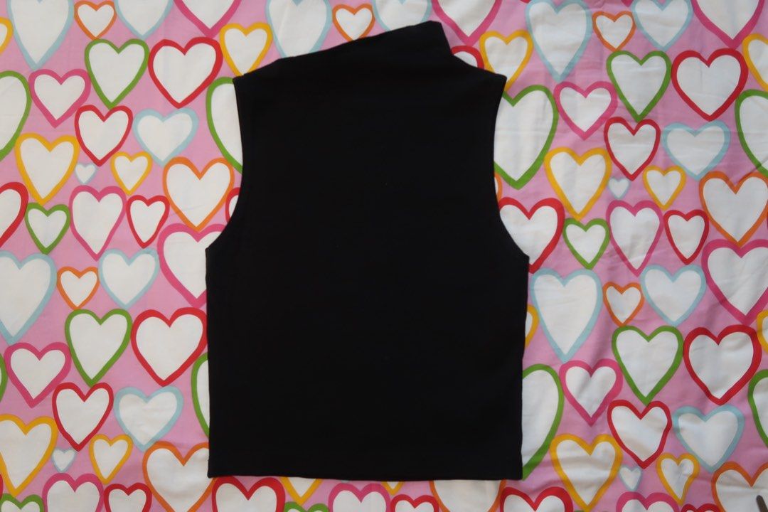 Sleeveless Turtleneck Top - Black and Gray (Category: Sleeveless) located in Paranaque City. Submitted by lovedbycamilla (Listing ID 1439183347, Image 3). Description: - Used less than 10x - Fits S-M - Sleeveless tops - Colors: Black and Gray - 170 Each, 300 Take All - Flattering asymmetrical neckline - Fitted silhouette - Soft, stretchy fabric.