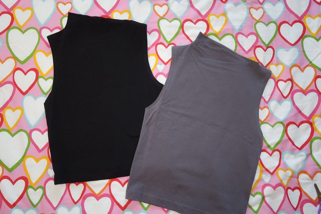 Sleeveless Turtleneck Top - Black and Gray (Category: Sleeveless) located in Paranaque City. Submitted by lovedbycamilla (Listing ID 1439183347, Image 1). Description: - Used less than 10x - Fits S-M - Sleeveless tops - Colors: Black and Gray - 170 Each, 300 Take All - Flattering asymmetrical neckline - Fitted silhouette - Soft, stretchy fabric.