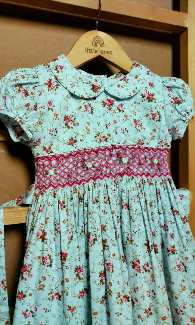 Smocked Dress for Toddlers (Category: Babies & Kids Fashion) located in Caloocan City. Submitted by clairyyyyy (Listing ID 1439133914, Image 3). Description: - Adorable smocked dress for toddlers (3-4 years old). - Features a charming floral pattern. - Classic Peter Pan collar. - Comfortable short sleeves. - Stylish tie-back design. - Perfect for special occasions and everyday wear. - Brand: Juniors.