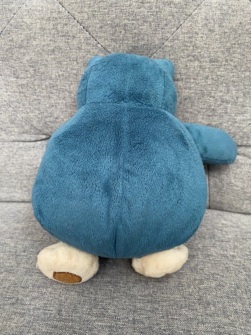 Snorlax Plush Toy OFFICIAL (Category: Plushies & Soft Toys) located in Cavite. Submitted by lymseven (Listing ID 1439130729, Image 2). Description: Bought from Japan Bigger than Palm Size NO TAG Official Tag CUT No Defects Slightly Stained, Not Visible Rough Texture .