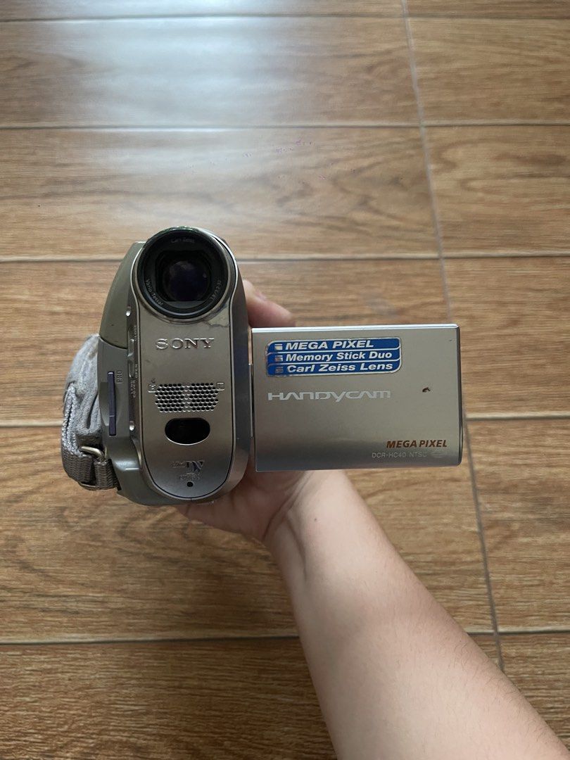 Sony Handycam DCR-HC40 MiniDV (Category: Video Cameras) located in San Pablo. Submitted by teenagegrrlgang (Listing ID 1439128013, Image 1). Description: Selling my Sony DCR-HC40 camcorder. Overall unit is working and can still record/playback properly. Condition: - Camera is fully functional (video/audio recording works) - LCD screen is not working / has display issue - You can still use and view footage through the viewfinder - Buttons and main