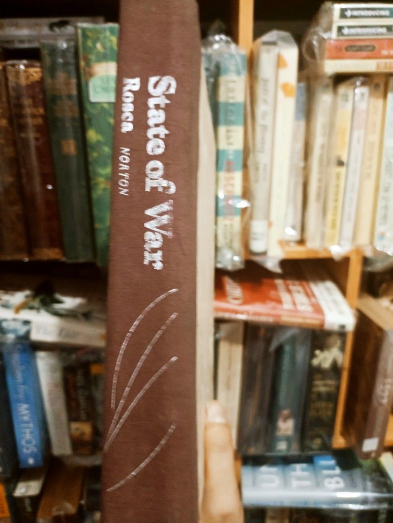 State of War by Ninotchka Rosca (Category: Storybooks) located in Cavite. Submitted by ji_kang (Listing ID 1439156037, Image 1). Description: - 'State of War' by Ninotchka Rosca - Published by W.W. Norton & Company - Published in New York and London About this book: The novel centers around a failed assassination attempt against the authoritarian ruler Ferdinand Marcos, referred to as "The Commander." It delves into the historical context of the 