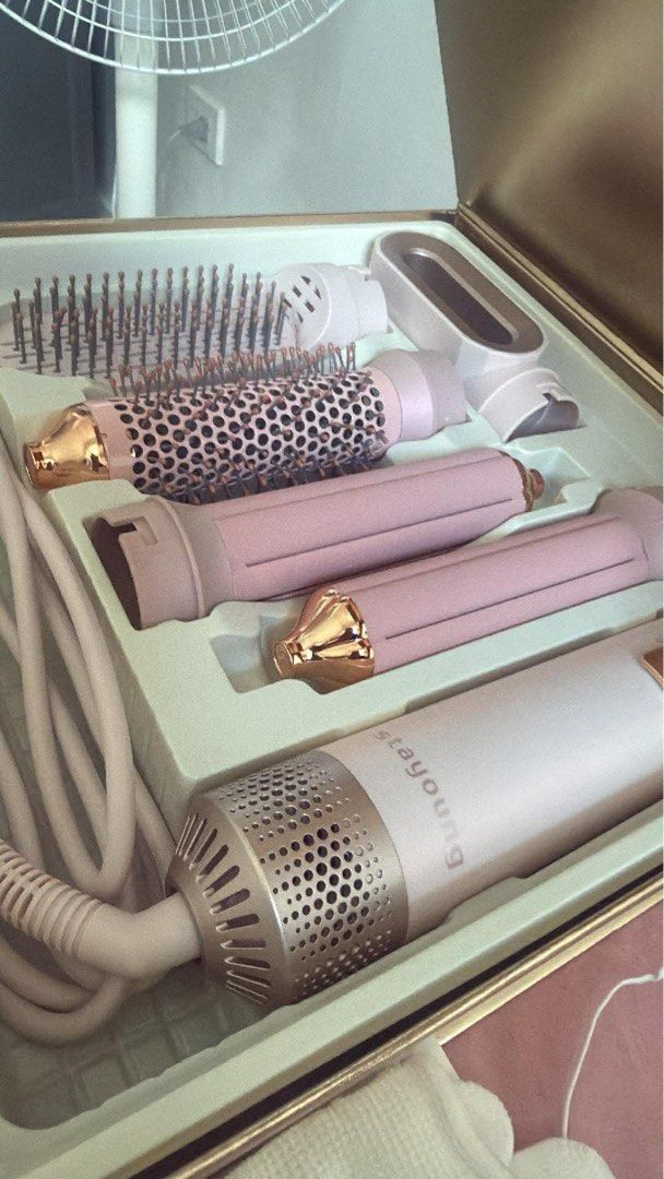 Stayoung Pro Pink 5 in 1 (Category: Hair) located in Cavite. Submitted by johannaaliyah (Listing ID 1439247264, Image 1). Description: rfs : used once tinry lang & i alr bought dyson you can also message me on ig : alyjohann Introducing the STAYOUNG 5-in-11 Hair Styler Pro ONLY for the Golden Pink Special Edition, this multifunctional tool revolutionizes your styling routine. It combines a hair dryer, straightener, curling iron, volumizing brush,