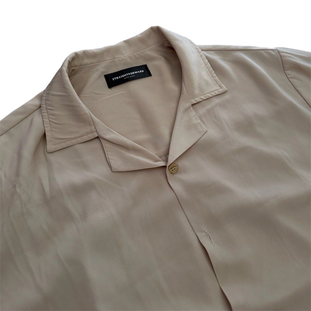 Straightforward Beige button down polo shirt (Category: Tshirts & Polo Shirts ) located in Manila. Submitted by dja23 (Listing ID 1439236098, Image 2). Description: Width: 25 in Length: 29 in Sleeve length: 10 in Color may vary due to lighting, missing button, no refund/return unless valid reasoning.