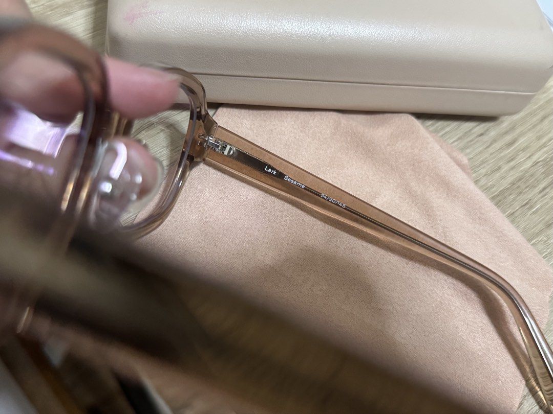 Sunnies Studios Lark Sesame Eyeglasses (Category: Sunglasses & Eyewear) located in Batangas. Submitted by heeybbb (Listing ID 1439180538, Image 2). Description: - Sunnies Studios Lark eyeglasses in Sesame - Includes original case and soft pouch - Frame size: 52/17/145 - Light brown frame - Light beige case - with grade & anti rad adaptive - photochromic lens - barely used .