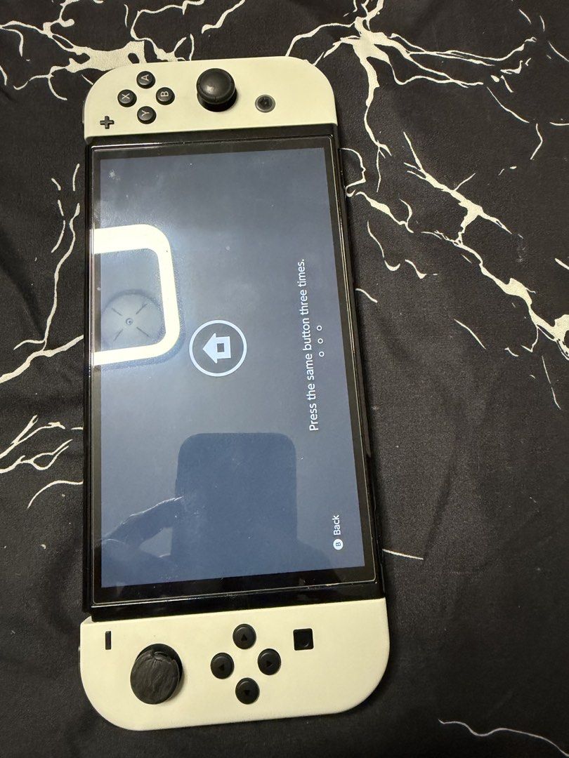 switch oled (Category: Nintendo) located in Singapore. Submitted by csplayer18 (Listing ID 1439219424, Image 1). Description: switch oled. 2nd gen.. defect is left anolog rubber worn out comes wih original charger and dock only. no scratch on screen. .