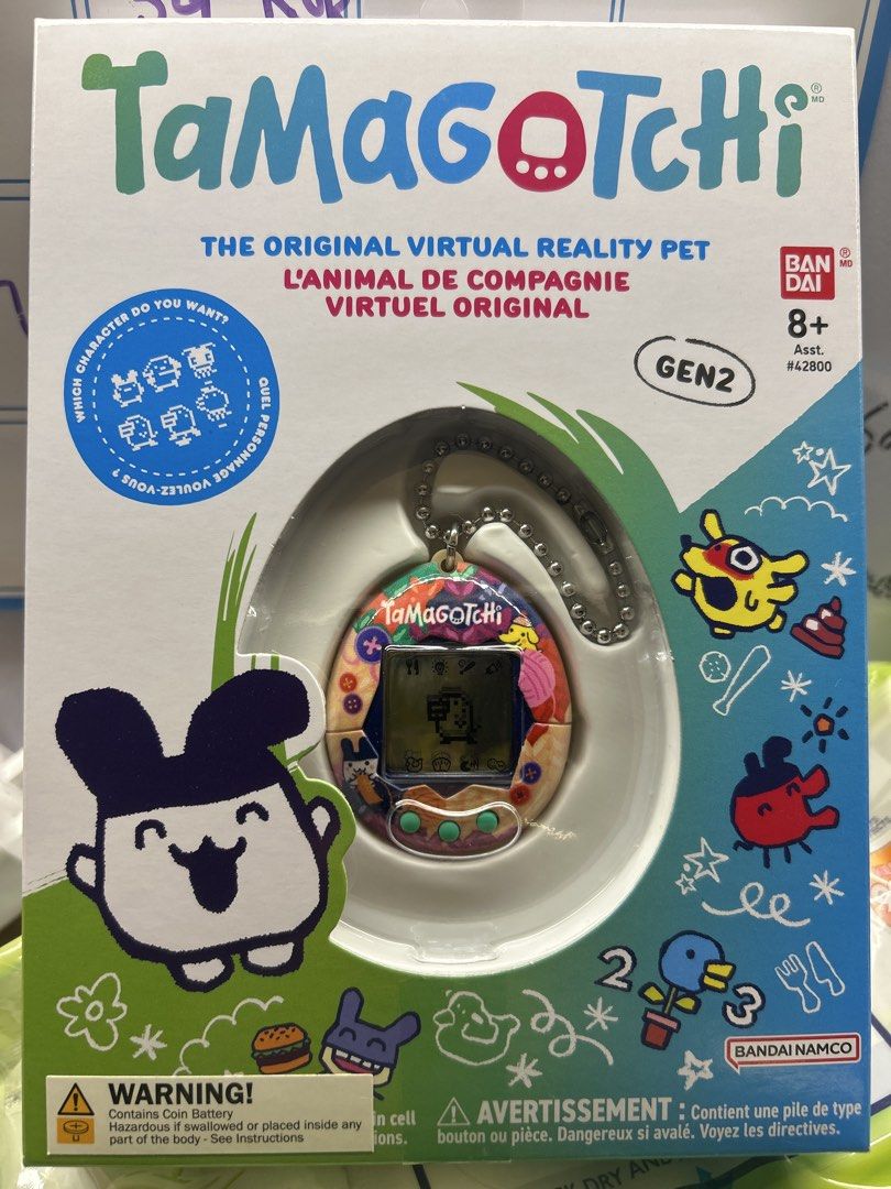 Tamagotchi Gen2 Virtual Pet - Brand New (Category: Interactive Toys) located in Singapore. Submitted by hclc_ (Listing ID 1439218832, Image 1). Description: - Brand new, unopened Tamagotchi Gen2 - Experience the original virtual pet gameplay - Features various characters to raise - Perfect for collectors and nostalgic fun - Batteries included.