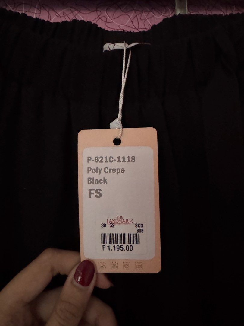 The Landmark Poly Crepe Black Pants (Category: Other Bottoms) located in Las Pinas. Submitted by sadiembv (Listing ID 1439209417, Image 2). Description: - Landmark Black Poly Crepe Pants - Wide-leg design - Elastic waistband with tie - Size: FS - Original Price: P1,195.00 - Comfortable and stylish.