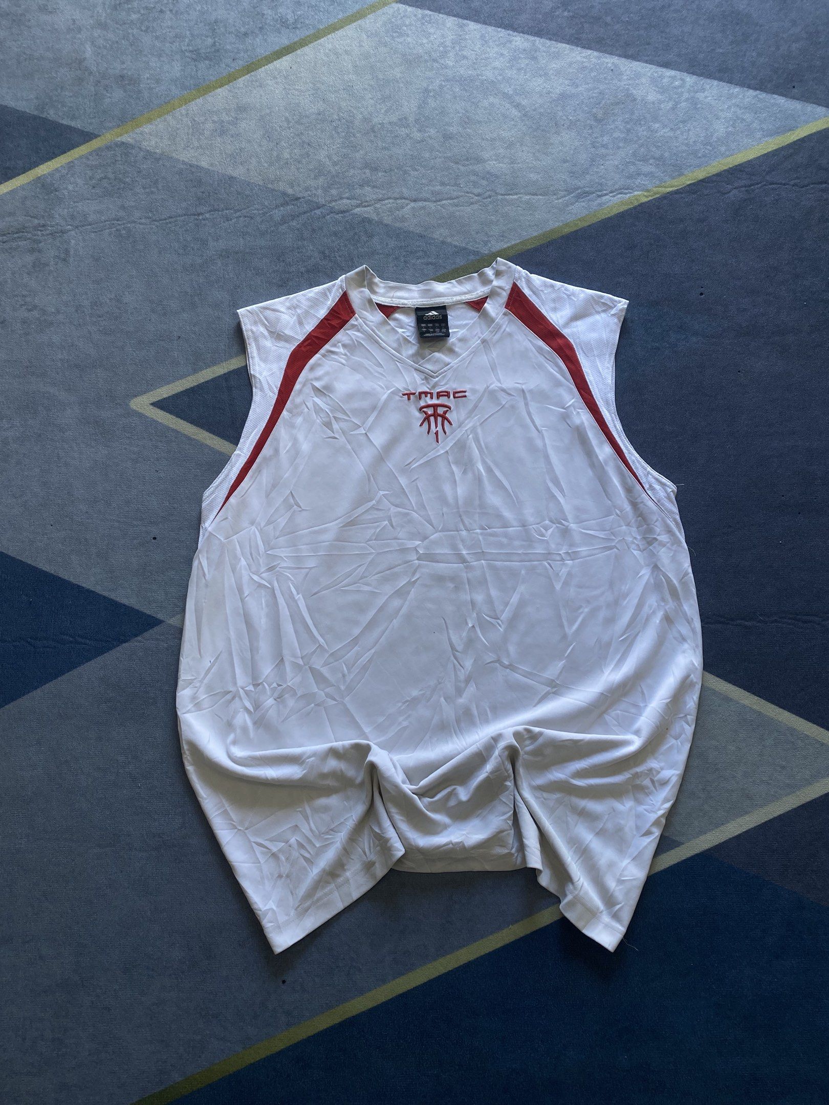 Tmac x Adidas (Category: Activewear) located in Inodaran. Submitted by sai_thriftdrift (Listing ID 1439245502, Image 1). Description: Dimes 22 x 31 Issue not shown pinhole minimal Condition 9.8/10 Color rate 9.8/10.