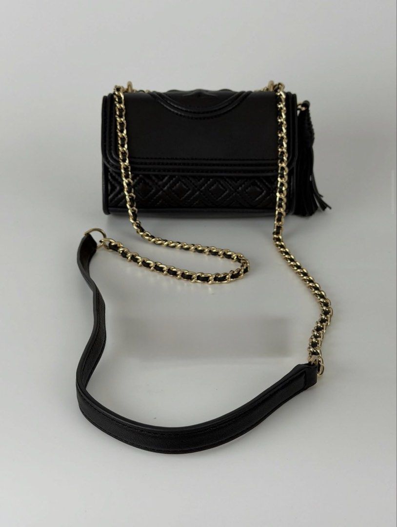 Tory Burch Fleming Mini crossbody chain sling flap bag (Category: Luxury Bags & Wallets) located in Manila. Submitted by karminareyes123 (Listing ID 1439236877, Image 1). Description: - I got it from luxebaghaven on ig (they sell legit luxury bags) -Tory Burch Kira Chevron Small Crossbody Bag - Elegant diamond-quilted pattern - Features a convenient chain strap - Includes a stylish tassel detail - Compact size, ideal for daily essentials - Flap c