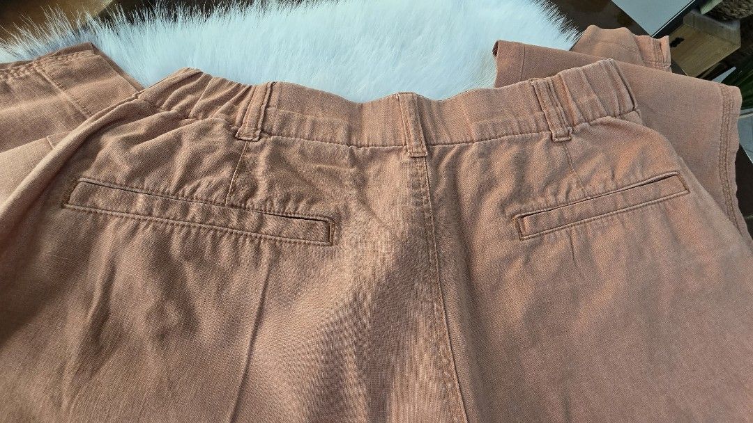 Uniqlo Linen Blend Pants - Size M (Category: Other Bottoms) located in Quezon City. Submitted by bringjoy (Listing ID 1439091342, Image 3). Description: - Uniqlo linen-cotton blend pants - Relaxed fit - Comfortable elastic waistband at the back - Classic button and zipper closure - Features two back pockets - Color: Muted peach/terracotta - Size: M - Waist: 63-69cm - Hips: 88-94cm.