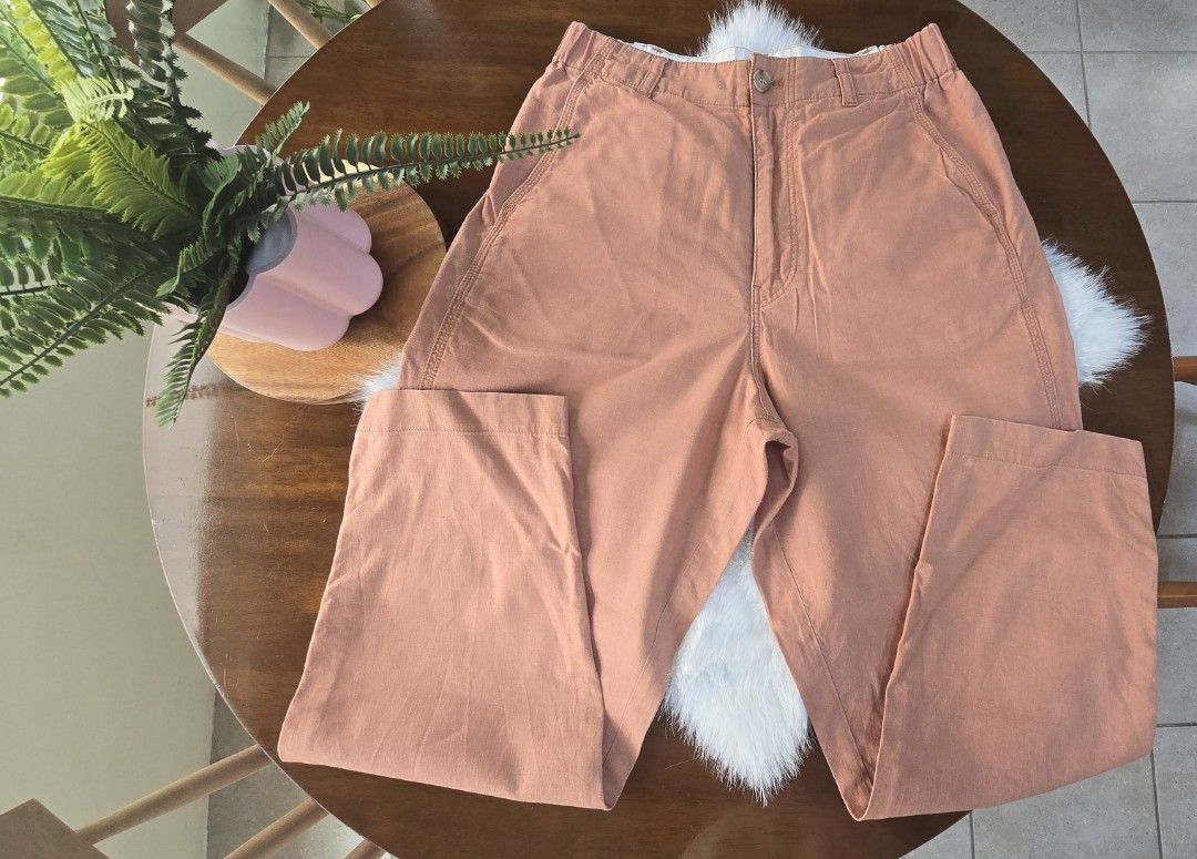 Uniqlo Linen Blend Pants - Size M (Category: Other Bottoms) located in Quezon City. Submitted by bringjoy (Listing ID 1439091342, Image 1). Description: - Uniqlo linen-cotton blend pants - Relaxed fit - Comfortable elastic waistband at the back - Classic button and zipper closure - Features two back pockets - Color: Muted peach/terracotta - Size: M - Waist: 63-69cm - Hips: 88-94cm.