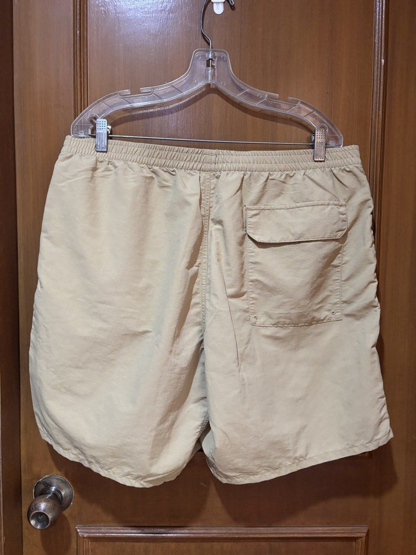 Uniqlo Shorts XL (Category: Shorts) located in Manila. Submitted by senior.declutter (Listing ID 1439081569, Image 2). Description: - Uniqlo Tan Shorts ( swim wear compatible) - Size: XL - Color: Neutral Tan - Features: - Elastic waistband with drawstring - Two side pockets - One back pocket with button closure - Mesh lining - Outer: 100% nylon - Inner: 100% polyester RFS: decluttering .