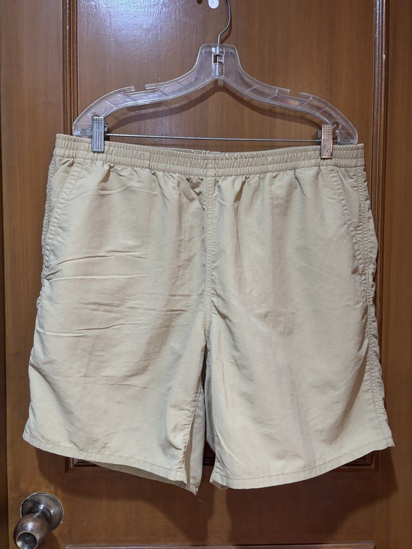 Uniqlo Shorts XL (Category: Shorts) located in Manila. Submitted by senior.declutter (Listing ID 1439081569, Image 1). Description: - Uniqlo Tan Shorts ( swim wear compatible) - Size: XL - Color: Neutral Tan - Features: - Elastic waistband with drawstring - Two side pockets - One back pocket with button closure - Mesh lining - Outer: 100% nylon - Inner: 100% polyester RFS: decluttering .