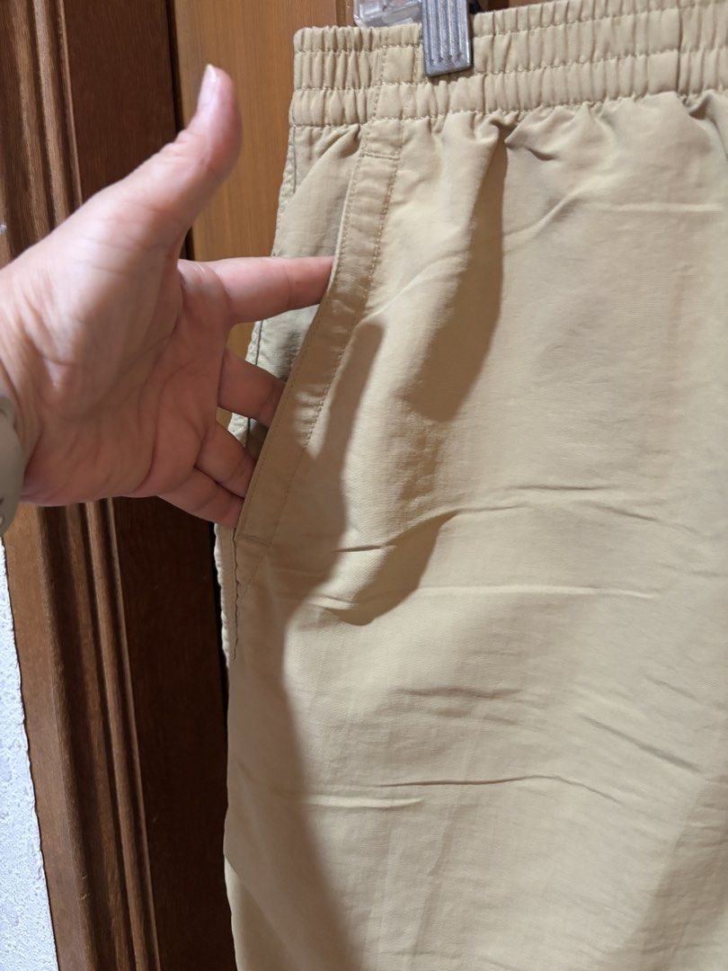 Uniqlo Shorts XL (Category: Shorts) located in Manila. Submitted by senior.declutter (Listing ID 1439081569, Image 3). Description: - Uniqlo Tan Shorts ( swim wear compatible) - Size: XL - Color: Neutral Tan - Features: - Elastic waistband with drawstring - Two side pockets - One back pocket with button closure - Mesh lining - Outer: 100% nylon - Inner: 100% polyester RFS: decluttering .
