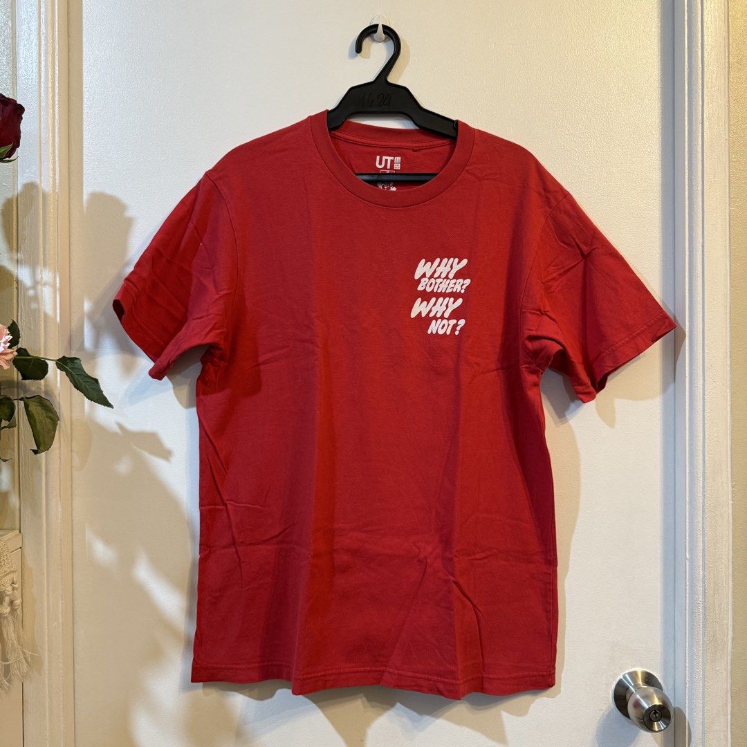 Uniqlo UT Red Graphic Tee Size M (Category: Tshirts & Polo Shirts ) located in Pasig City. Submitted by thethrifter30 (Listing ID 1439153987, Image 2). Description: - Uniqlo UT t-shirt - Red color - Features "WHY BOTHER? WHY NOT?" graphic print (front and back) - Crew neck style - Estimated size: Medium - Made of soft, comfortable material - Perfect for casual wear.