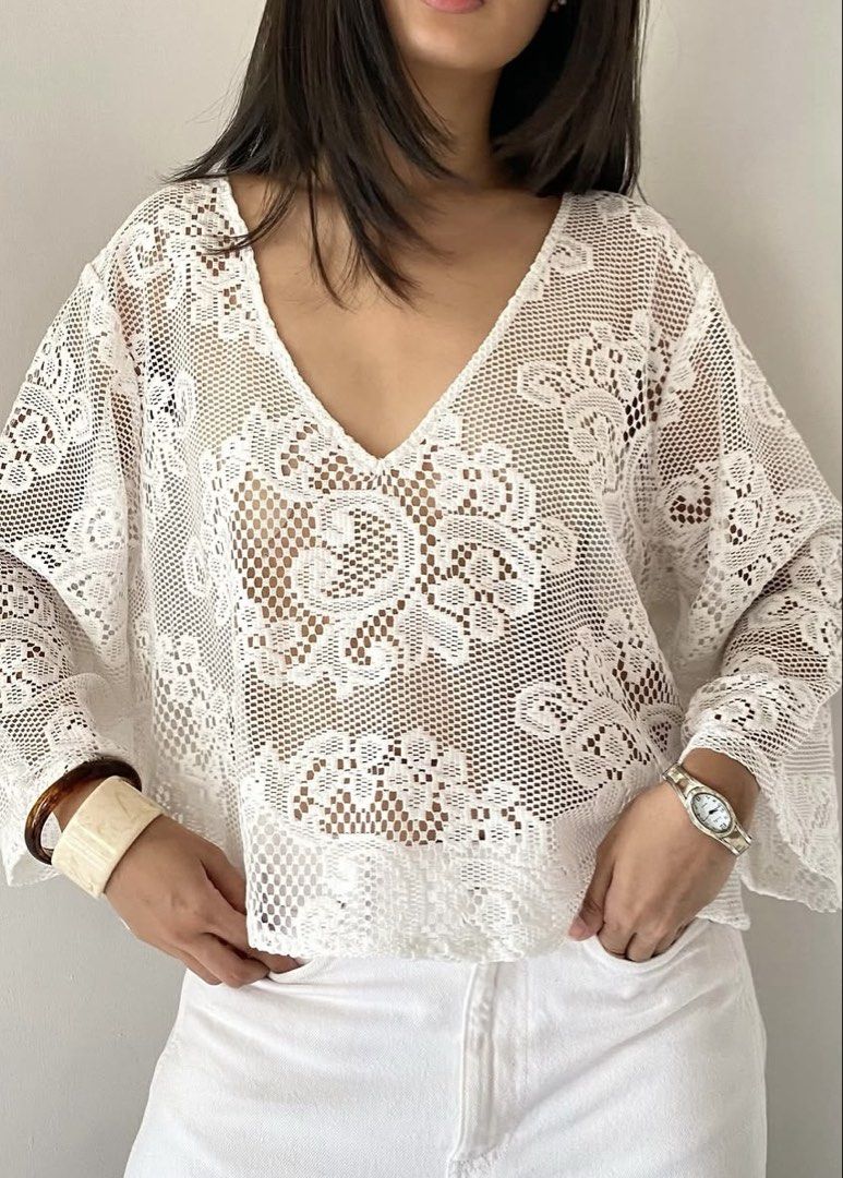 Vin the Line White Lace Blouse Top (Category: Blouses) located in Makati City. Submitted by shlyclosettt (Listing ID 1439163583, Image 2). Description: - Super Rare White lace top - V-neck design - Fits S-M (Bust can fit up to 38” and Length 20” - Loose Fit - Intricate lace pattern - Versatile for layering or wearing alone - Price is negotiable if sure buyer :) .