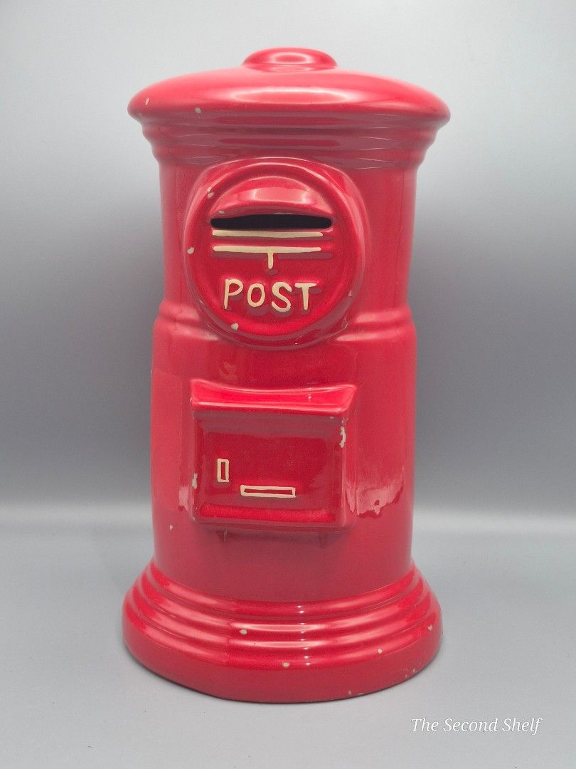 Vintage Red Post Box Coin Bank / Mailbox Ceramic Decor (Category: Other Home Decor) located in Santa Rosa. Submitted by thesecondshelf (Listing ID 1439228042, Image 1). Description: Vintage Red Post Box Coin Bank / Mailbox Ceramic Decor ₱600 Vintage ceramic post box coin bank in bright glossy red finish. Charming British-style pillar mailbox design with nice display size at around 25cm tall. Great for shelf decor, cafe styling, or collectors of q