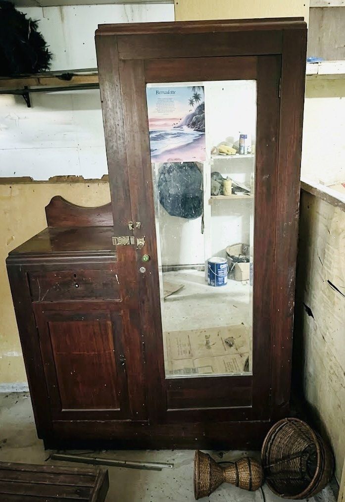 Vintage Wooden Wardrobe with Mirror (Category: Shelves, Cabinets & Racks) located in Marikina City. Submitted by azzirkram76288 (Listing ID 1439080316, Image 2). Description: - Antique Narra wooden wardrobe - Mirror door - Multiple shelves - Drawer - Hanging rod - Side cabinet with drawer and door - Dark wood finish - Spacious design - Perfect for clothes and storage.