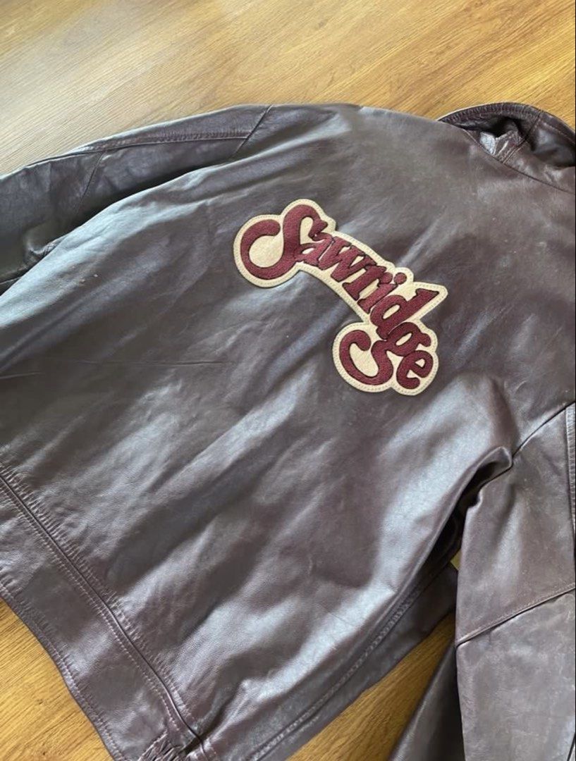 Vintage Y2K Varsity Sawridge Leather Jacket (Category: Coats, Jackets and Outerwear) located in Quezon City. Submitted by thrift.tingz (Listing ID 1439139221, Image 3). Description: - Vintage leather jacket from Image Uniform - Brown leather exterior - Beige stripes and "Sawridge" patch - Button-up front - Collar - Size: 44T - Made in Edmonton, Alberta - Dimensions: length - 26 arms - 25 shoulders - 19 chest - 22.