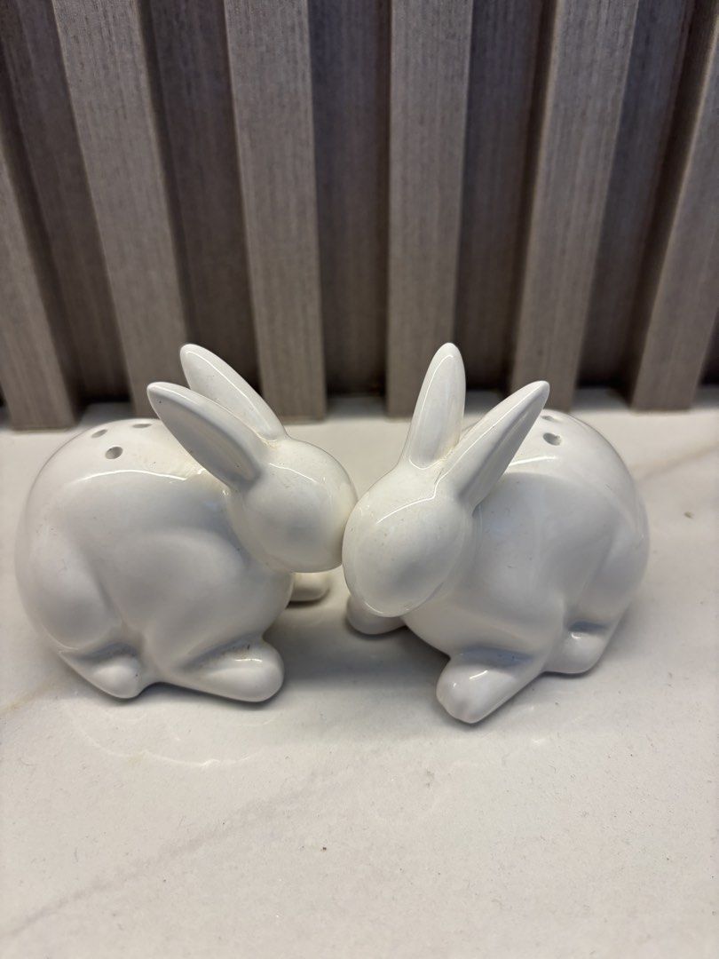 White Ceramic Bunny Salt and Pepper Shakers Set (Category: Dinnerware & Cutlery) located in Cavite. Submitted by ejp3773 (Listing ID 1439095897, Image 1). Description: - Adorable bunny-shaped salt and pepper shakers. - Made of white ceramic. - Each shaker has a hole for dispensing. - Set includes two shakers. - Adds a whimsical touch to your table. - no rubber stopper included - never used. Displayed only..