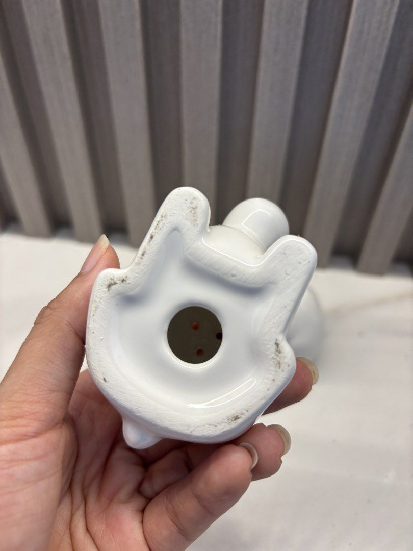 White Ceramic Bunny Salt and Pepper Shakers Set (Category: Dinnerware & Cutlery) located in Cavite. Submitted by ejp3773 (Listing ID 1439095897, Image 3). Description: - Adorable bunny-shaped salt and pepper shakers. - Made of white ceramic. - Each shaker has a hole for dispensing. - Set includes two shakers. - Adds a whimsical touch to your table. - no rubber stopper included - never used. Displayed only..