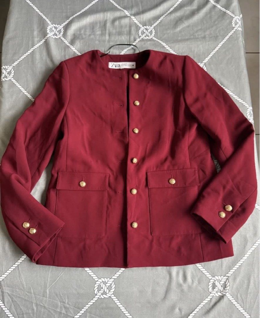 Zara Maroon Blazer with Gold Buttons (Category: Coats, Jackets and Outerwear) located in Makati City. Submitted by bibas.corner (Listing ID 1439233100, Image 3). Description: - Zara maroon blazer - Size: XS - Features: Round neckline, gold buttons, two front pockets - Style: Tailored fit - Made in Morocco.