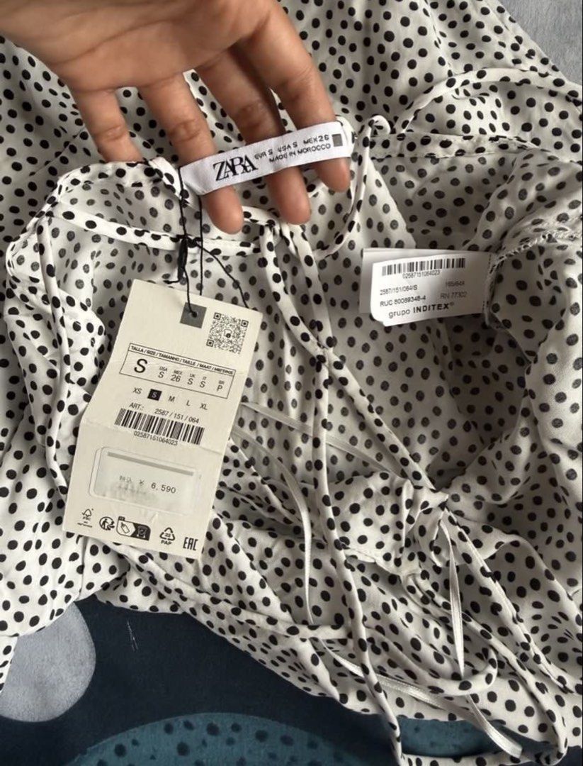 Zara Polka Dot Maxi Dress (Category: Dresses) located in Makati City. Submitted by bibas.corner (Listing ID 1439232669, Image 3). Description: - Zara maxi dress - Polka dot pattern - Spaghetti straps and cowl neckline - Size: Small - Made in Morocco - New with original tags - Perfect for casual wear or vacation.