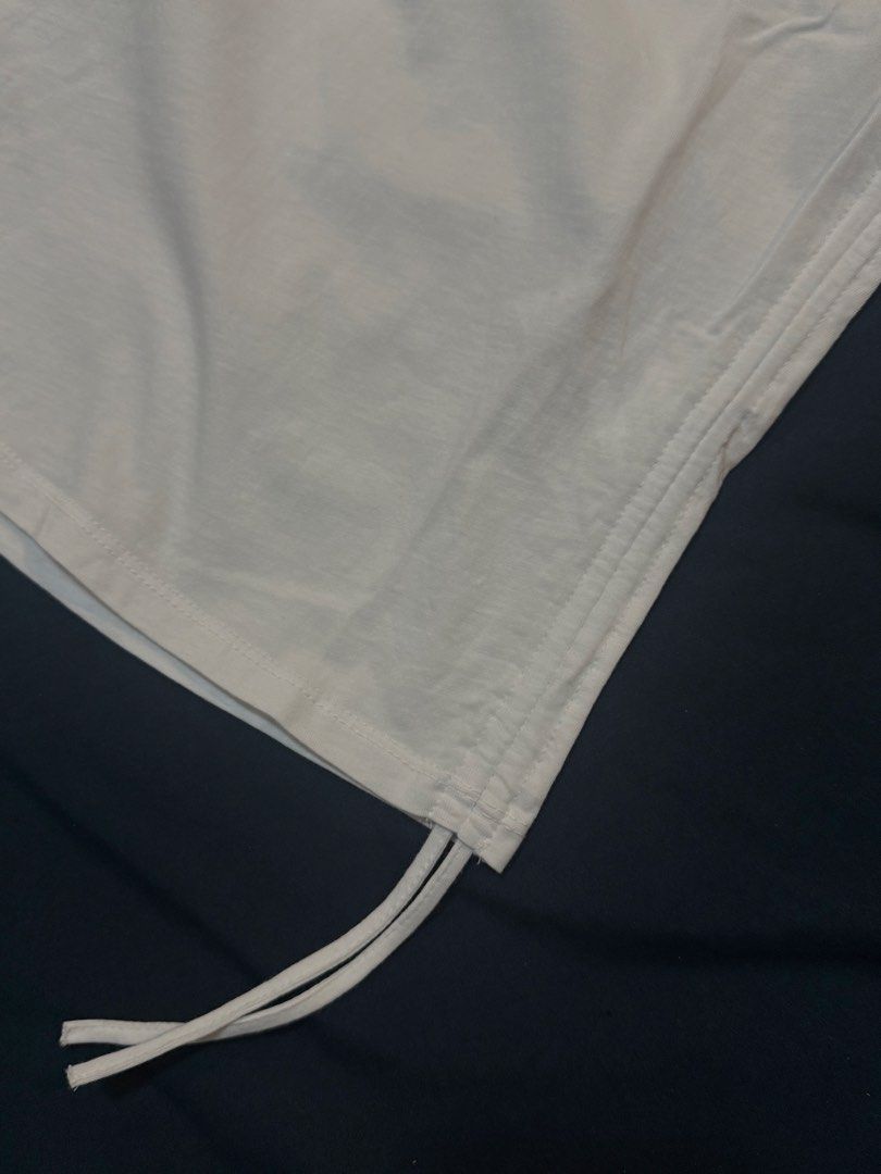 Zara White Ruched T-shirt (Category: Shirts) located in Masbate. Submitted by anjcbr (Listing ID 1439229836, Image 3). Description: - Zara white t-shirt - Ruched detailing on sides - Round neckline - Short sleeves - Bought for ₱695 or ₱795 - Washed and stored only, unused - Slight color variations on the photo due to lighting.