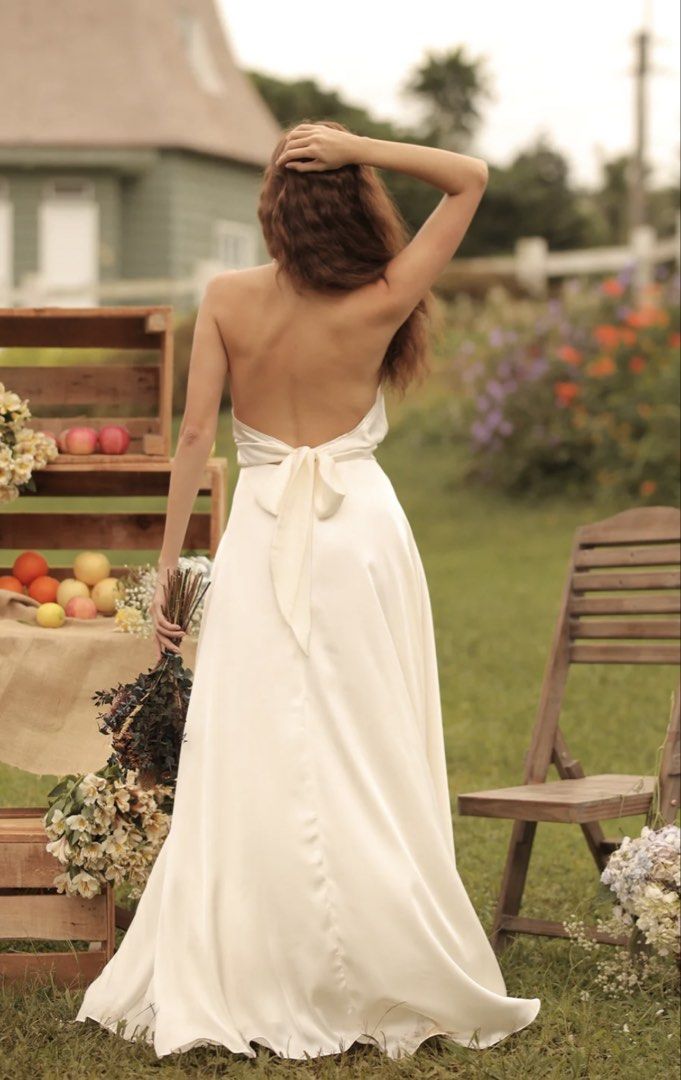 Zoo Halter Neck Slit Dress (Category: Dresses) located in Manila. Submitted by vivstudio (Listing ID 1439095628, Image 2). Description: WORN ONCE - Zoo halter neck dress - Elegant halter neckline - Open back with bow detail - Thigh-high slit.