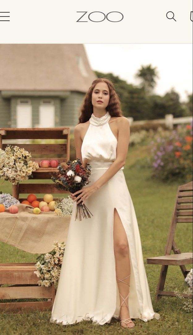Zoo Halter Neck Slit Dress (Category: Dresses) located in Manila. Submitted by vivstudio (Listing ID 1439095628, Image 1). Description: WORN ONCE - Zoo halter neck dress - Elegant halter neckline - Open back with bow detail - Thigh-high slit.