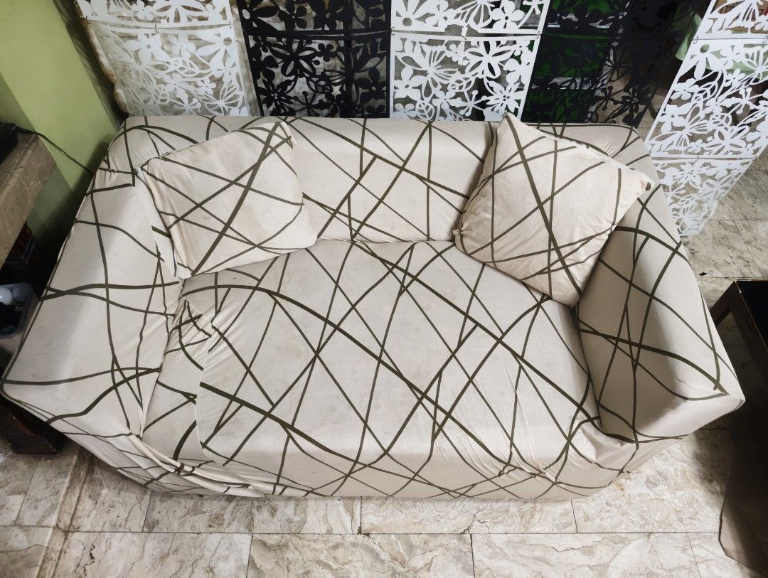 2-Seater Sofa / Couch with Cover and Pillows! (Category: Sofas) located in Quezon City. Submitted by franz14 (Listing ID 1439378774, Image 3). Description: Declutter #4 - 2-seater sofa with armrest! - Includes two matching throw pillows - Dark brown sofa (underneath cover) - Ideal for living rooms and seating areas only issue: nabutas na cover lang ng dog namin. and lost one foot, but can be fixed easily! 700 nalang! pamigay ko na..need lang tala