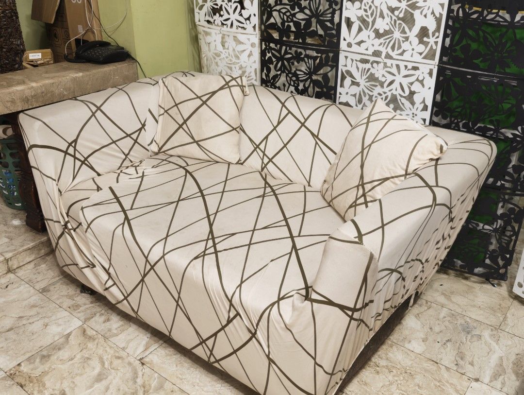 2-Seater Sofa / Couch with Cover and Pillows! (Category: Sofas) located in Quezon City. Submitted by franz14 (Listing ID 1439378774, Image 1). Description: Declutter #4 - 2-seater sofa with armrest! - Includes two matching throw pillows - Dark brown sofa (underneath cover) - Ideal for living rooms and seating areas only issue: nabutas na cover lang ng dog namin. and lost one foot, but can be fixed easily! 700 nalang! pamigay ko na..need lang tala