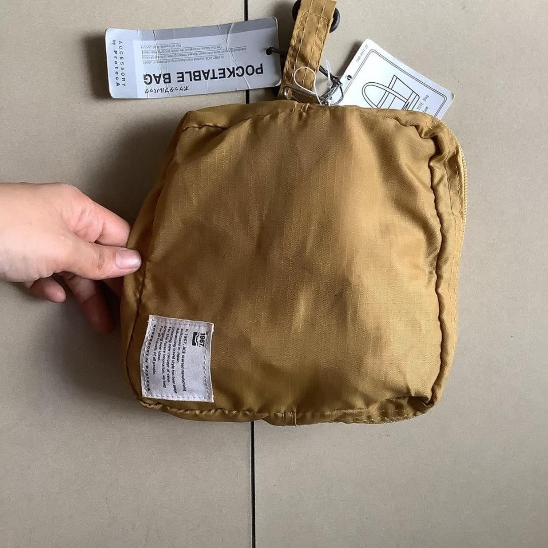ACE Pocketable packable Backpack bnew bag (Category: Backpacks) located in Manila. Submitted by lianlim.mail (Listing ID 1439308376, Image 3). Description: - Pocketable backpack in mustard yellow - Adjustable straps for a comfortable fit - Features a convenient front pocket - Bag+pouch set - bnew.