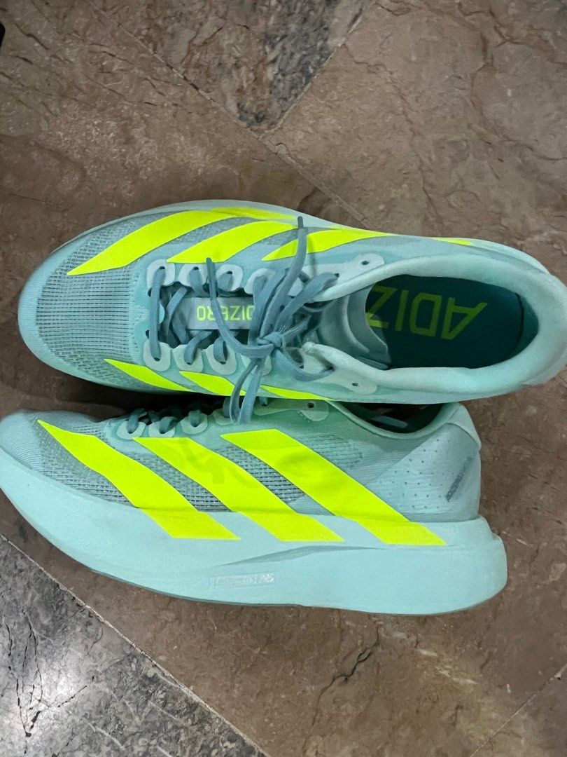 Adidas Adizero EVO SL (Category: Sneakers) located in Bacolod City. Submitted by chikiverd (Listing ID 1439247764, Image 3). Description: • Lightweight daily/race trainer • Color: Flash aqua/Lucid lemon/Mint Ton • Responsive LIGHTSTRIKE PRO cushioning • Breathable engineered mesh upper • Comfortable for long runs, speed work, and walking • Almost new, with box, used twice, needed to size up .
