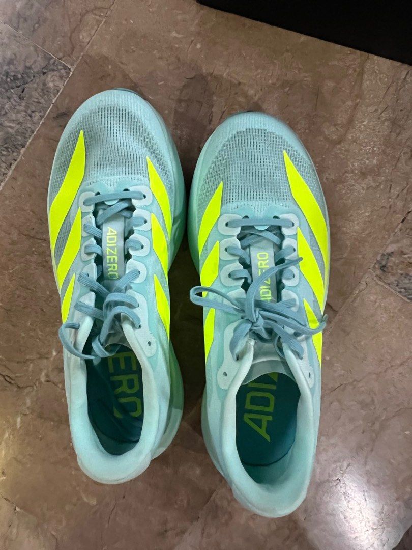 Adidas Adizero EVO SL (Category: Sneakers) located in Bacolod City. Submitted by chikiverd (Listing ID 1439247764, Image 2). Description: • Lightweight daily/race trainer • Color: Flash aqua/Lucid lemon/Mint Ton • Responsive LIGHTSTRIKE PRO cushioning • Breathable engineered mesh upper • Comfortable for long runs, speed work, and walking • Almost new, with box, used twice, needed to size up .