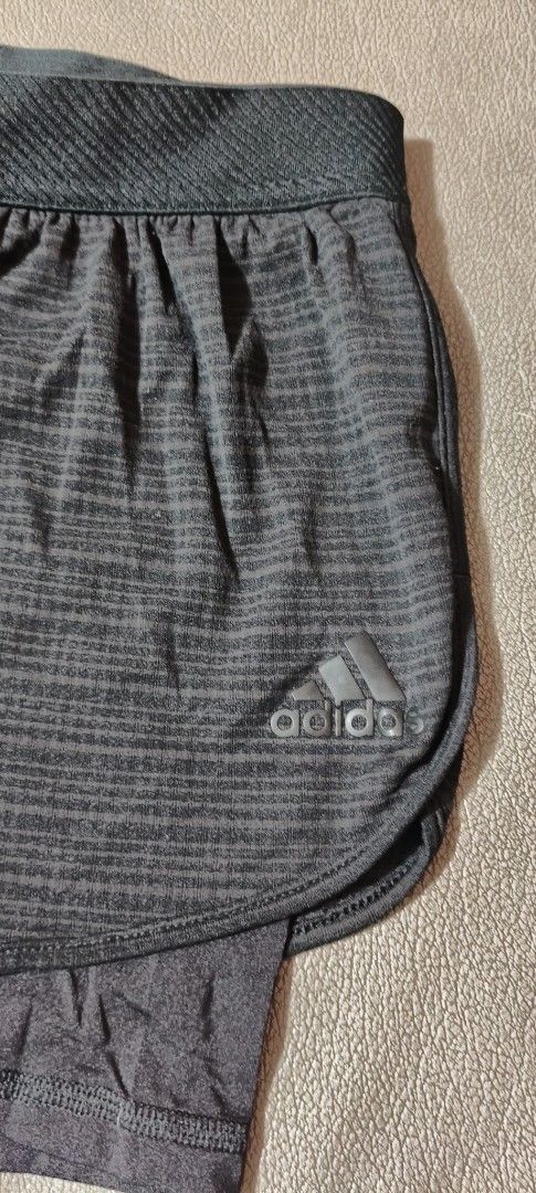 Adidas Girls' Shorts (Category: Babies & Kids Fashion) located in Quezon City. Submitted by liza.t (Listing ID 1439259906, Image 3). Description: - Adidas girls' shorts - Size: 9-10Y (140) - Design: Layered (darker inner, lighter outer) - Features Adidas logo - Made in Cambodia.