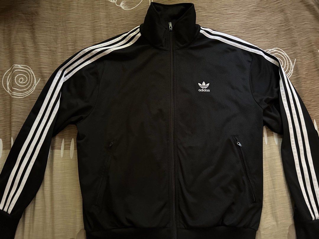 Adidas Track Jacket (Category: Coats, Jackets and Outerwear) located in Manila. Submitted by labrhinth (Listing ID 1439334513, Image 1). Description: Authentic Good as new No issue Get niu na pm lng pls.