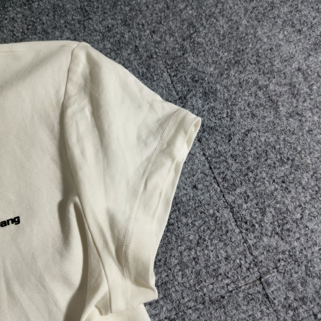 Alexander Wang Basic Logo Short-Sleeve T-shirt (Category: Luxury Apparel) located in Antipolo. Submitted by soon2byours_ (Listing ID 1439378151, Image 2). Description: Dimensions (laid flat): Pit to Pit: 18" Length: 21" [Medium on tag] Flaws: minor stains Color Rate: 10/10 (white) Condition: EXCELLENT COLOR MAY VARY DUE TO LIGHTING!.