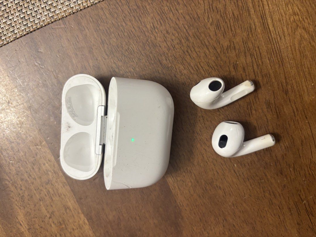 Apple AirPods 3rd Generation (Category: Earphones) located in Manila. Submitted by maxybrandy (Listing ID 1439259093, Image 1). Description: - Apple AirPods 3rd Generation with charging case - Charging case has a green light indicator - Case has visible marks and scratches - Earbuds have some wear and tear - Right earbuds sometimes charges but the problem is with the case. .