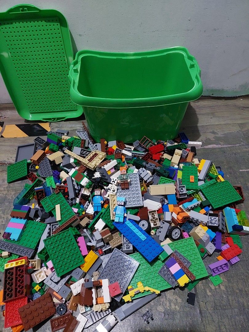 Assorted Lego Bricks with Storage Bin (Category: Lego & Building Sets) located in Quezon City. Submitted by jpnvintageonline (Listing ID 1439287835, Image 2). Description: - Large collection of assorted Lego bricks - Includes green baseplates and Minecraft figures - Comes with a green storage bin - Features various colors and sizes of bricks - Contains specialized Lego pieces - Ideal for building and creative play -almost 2kilos.