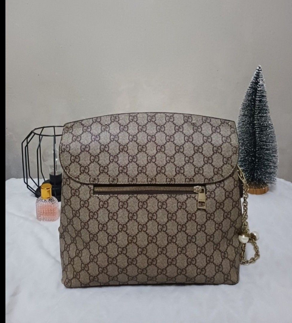 GUCCI GG SUPREME LEATHER MONOGRAM CROSSBODY BAG ✨ (Category: Luxury Bags & Wallets) located in Magalang. Submitted by itskate_cc (Listing ID 1439298964, Image 2). Description: GUCCI GG SUPREME LEATHER MONOGRAM CROSSBODY BAG ✨ A timeless luxury piece featuring the iconic Gucci GG Supreme monogram with premium leather accents, designed for both style and everyday functionality. This crossbody bag delivers a perfect blend of elegance and practicalit