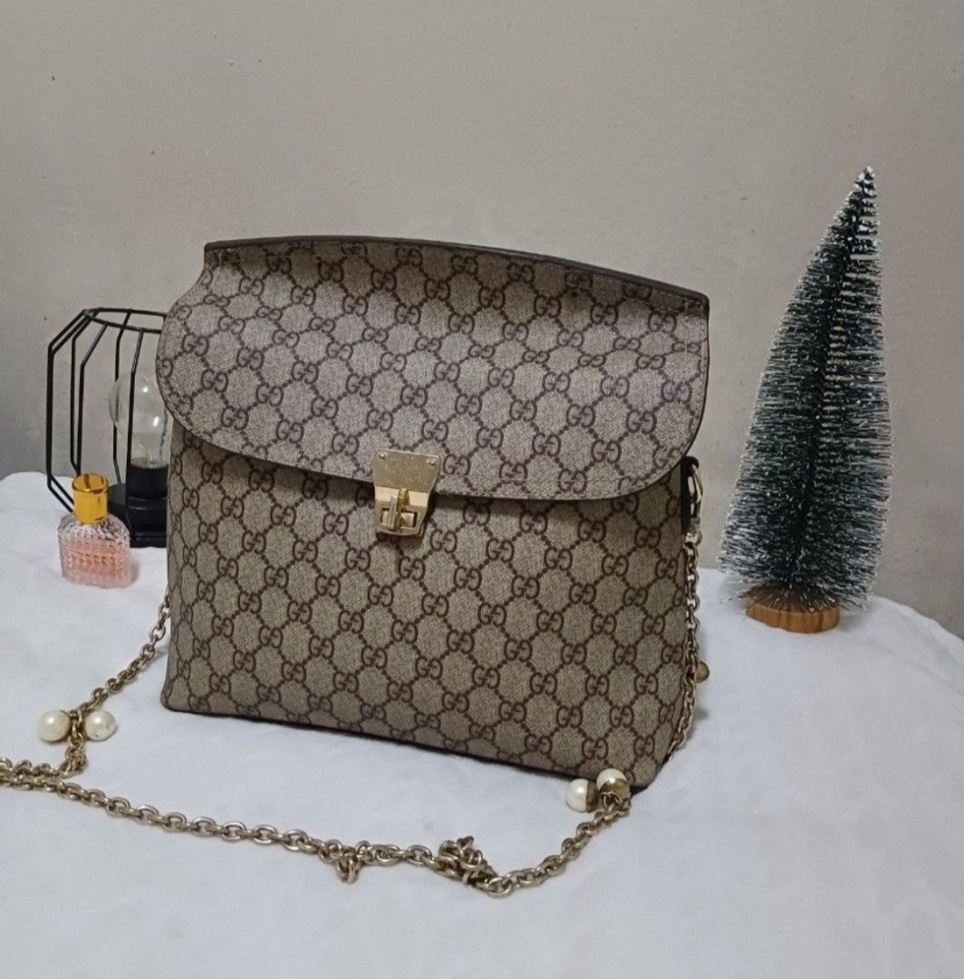 GUCCI GG SUPREME LEATHER MONOGRAM CROSSBODY BAG ✨ (Category: Luxury Bags & Wallets) located in Magalang. Submitted by itskate_cc (Listing ID 1439298964, Image 1). Description: GUCCI GG SUPREME LEATHER MONOGRAM CROSSBODY BAG ✨ A timeless luxury piece featuring the iconic Gucci GG Supreme monogram with premium leather accents, designed for both style and everyday functionality. This crossbody bag delivers a perfect blend of elegance and practicalit