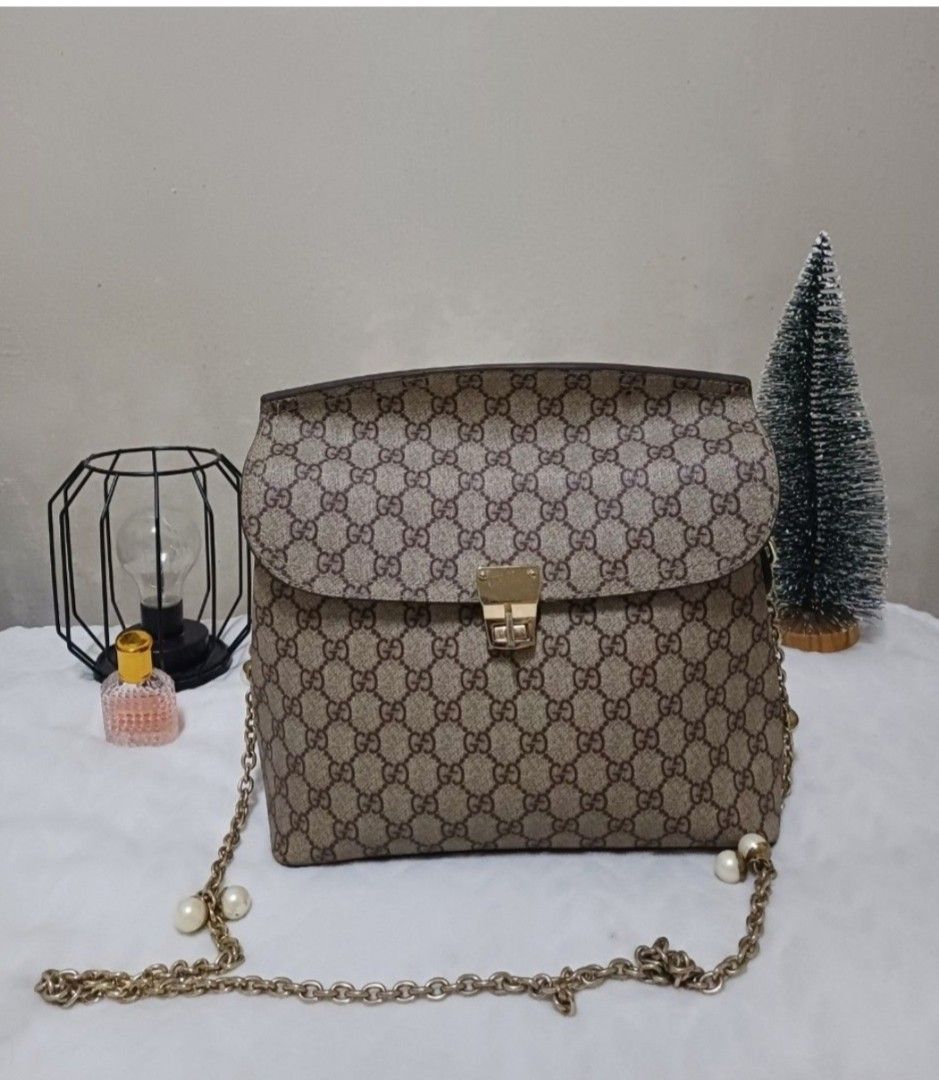 GUCCI GG SUPREME LEATHER MONOGRAM CROSSBODY BAG ✨ (Category: Luxury Bags & Wallets) located in Magalang. Submitted by itskate_cc (Listing ID 1439298964, Image 3). Description: GUCCI GG SUPREME LEATHER MONOGRAM CROSSBODY BAG ✨ A timeless luxury piece featuring the iconic Gucci GG Supreme monogram with premium leather accents, designed for both style and everyday functionality. This crossbody bag delivers a perfect blend of elegance and practicalit
