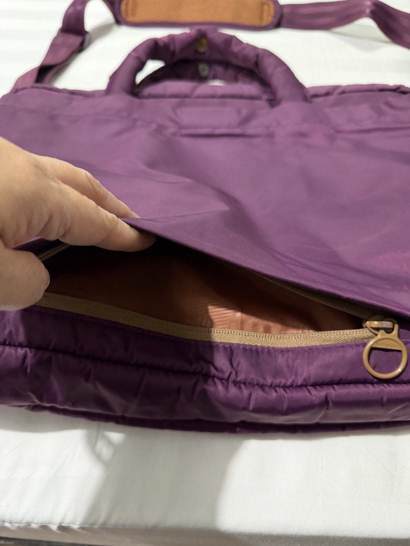 Authentic Hellolulu 15" Padded Laptop Bag / Briefcase (Plum/Purple) (Category: Laptop Bags & Sleeves) located in Marikina City. Submitted by kscanlas12 (Listing ID 1439380953, Image 2). Description: 9/10 (Excellent preloved condition, very clean interior and exterior, all zippers/snaps working perfectly) Fits up to 15” laptops: Has a dedicated, thickly padded mesh laptop sleeve section inside to secure your device. 2-Way Carry: Use the comfortabl