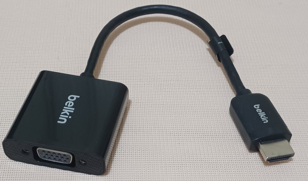 Belkin HDMI to VGA Projector Adapter (Category: Cables & Adaptors) located in Quezon City. Submitted by wjmae (Listing ID 1439276898, Image 1). Description: - Belkin HDMI to VGA adapter. - Converts HDMI to VGA for projectors and displays. - Supports audio and video output. - Includes original packaging. - Color: Black. - Convenient solution for connecting HDMI devices to VGA displays..
