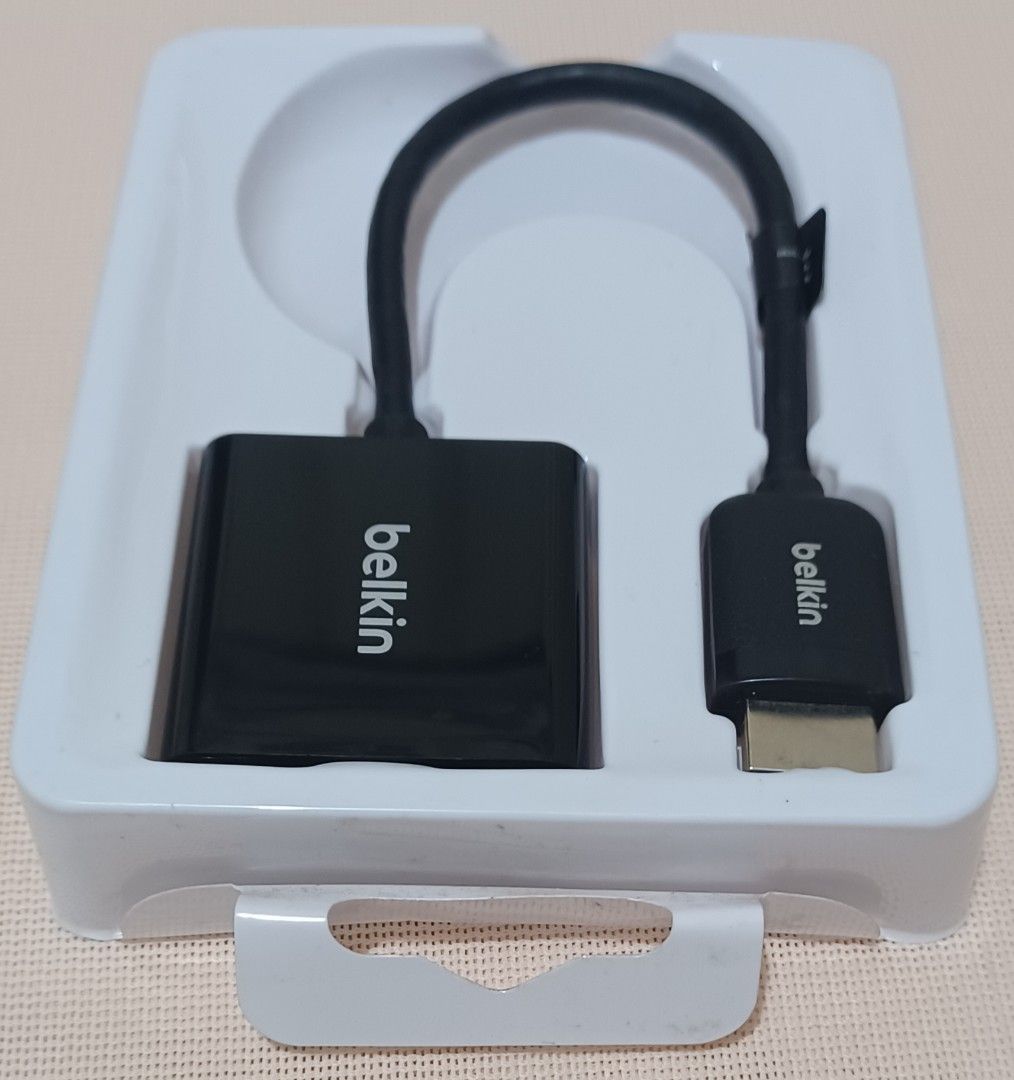 Belkin HDMI to VGA Projector Adapter (Category: Cables & Adaptors) located in Quezon City. Submitted by wjmae (Listing ID 1439276898, Image 3). Description: - Belkin HDMI to VGA adapter. - Converts HDMI to VGA for projectors and displays. - Supports audio and video output. - Includes original packaging. - Color: Black. - Convenient solution for connecting HDMI devices to VGA displays..