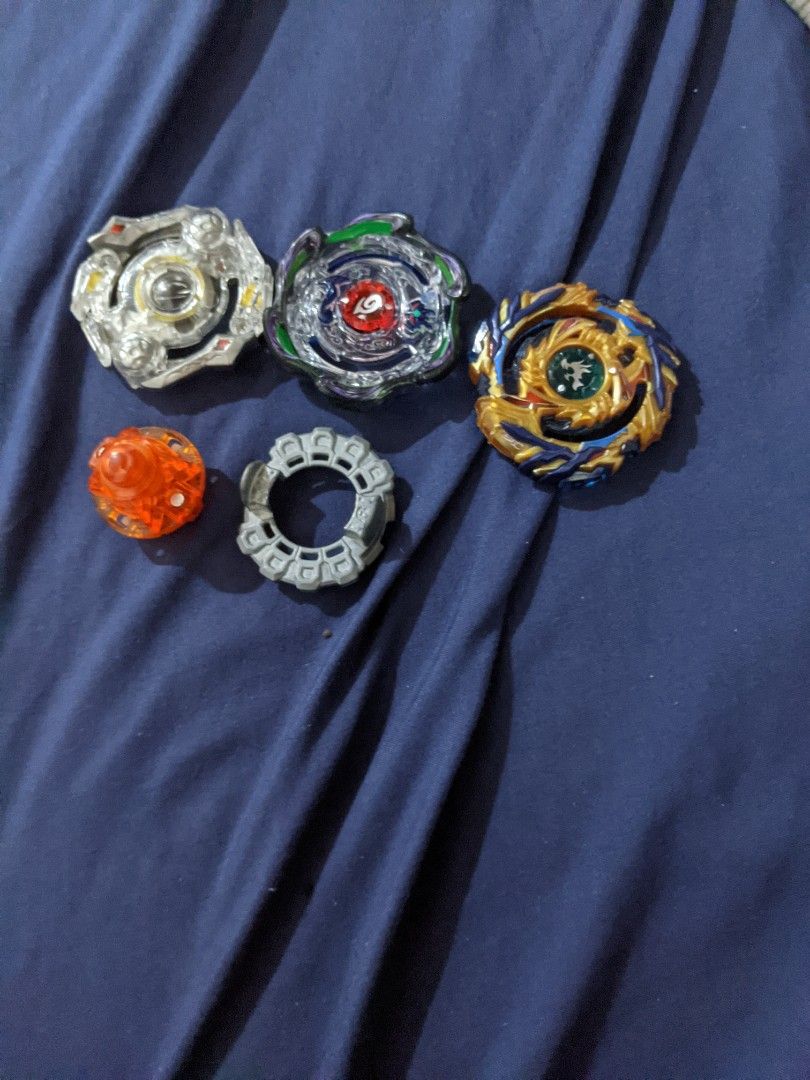 (PRE LOVED) beyblade burst set (Category: Action & Battle Toys) located in Manila. Submitted by marcandrew.1 (Listing ID 1439352476, Image 1). Description: beyblade burst takara tomy no launcher chat if u want more details.