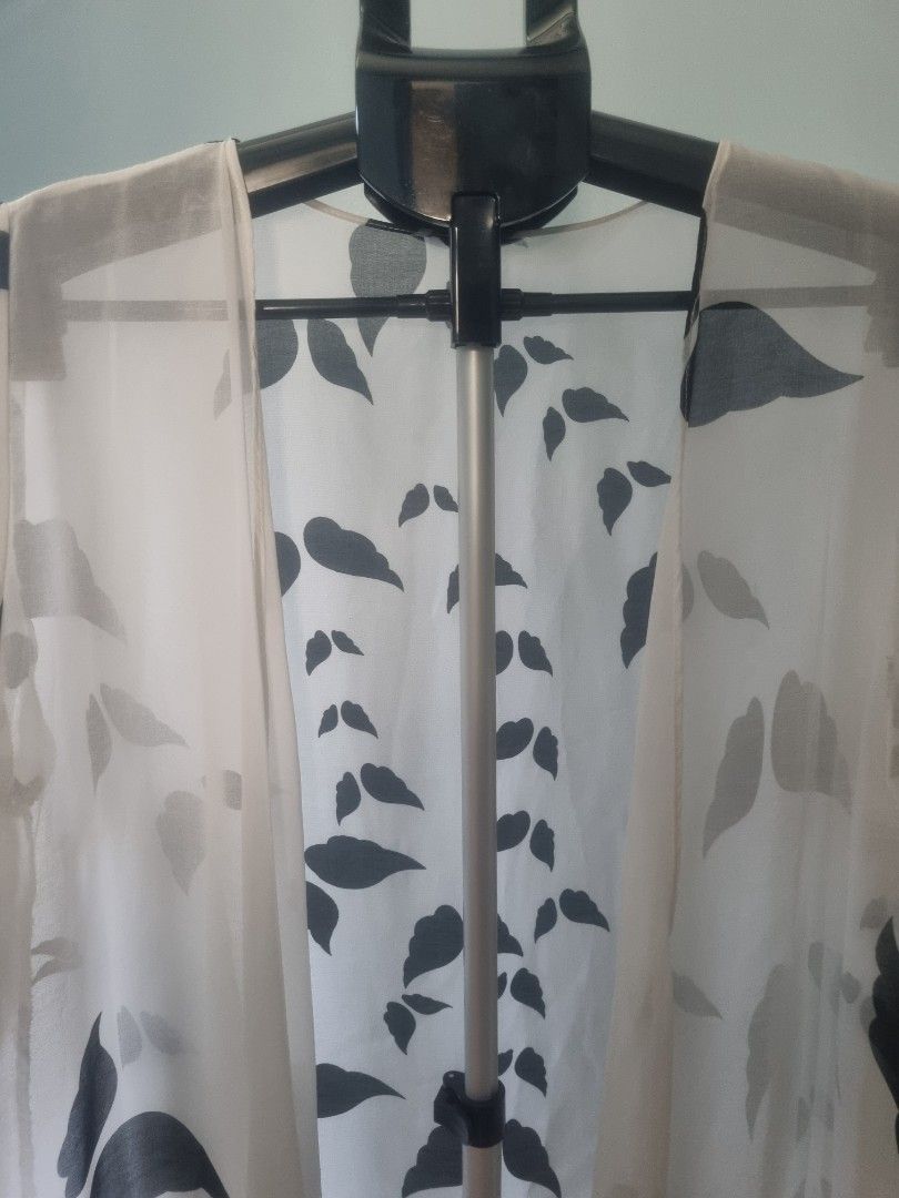 Black & White Print Kimono Cover-up (Category: Coats, Jackets and Outerwear) located in Las Pinas. Submitted by homedispatch (Listing ID 1439351798, Image 3). Description: Product: Black & White Kimono Top Condition: Like new Price: ₱150 Size: Free size Dimensions (approx. when laid flat): • Length: 25" • Shoulders: 15.5" • Underarm: 10" • Arm length: 13" Flaws: No noticeable flaws RfS: Decluttering *Model photos are digitally generated for styli